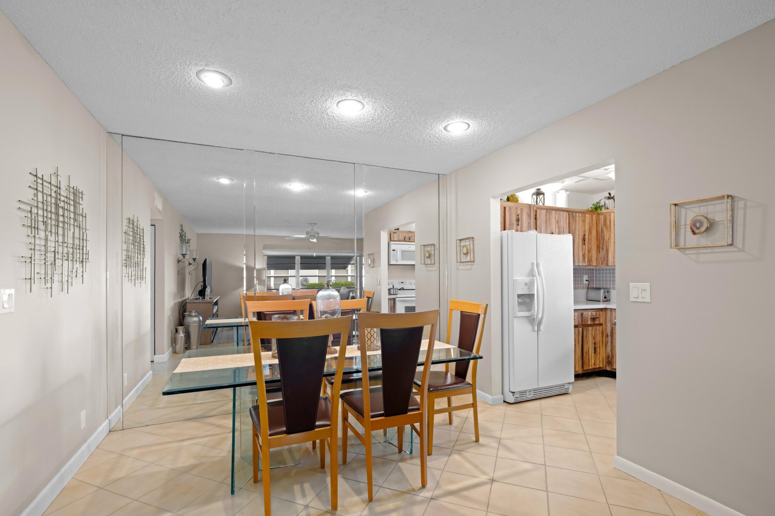 14609 Canalview Drive, Unit 231A Delray Beach, FL 33484 - Photo 6 of 33 a view of a dining area with furniture