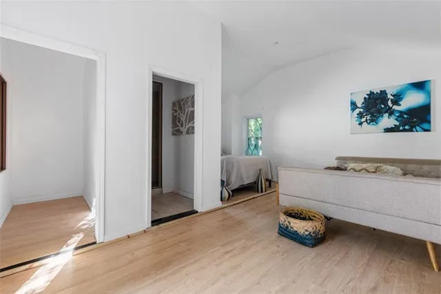 a room with furniture and wooden floor