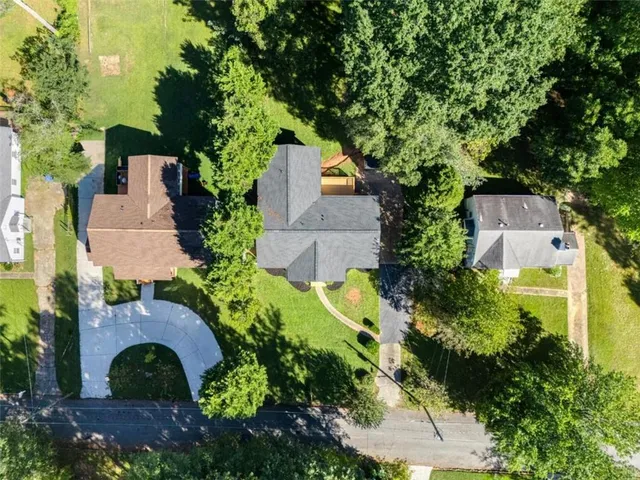 an aerial view of house with yard