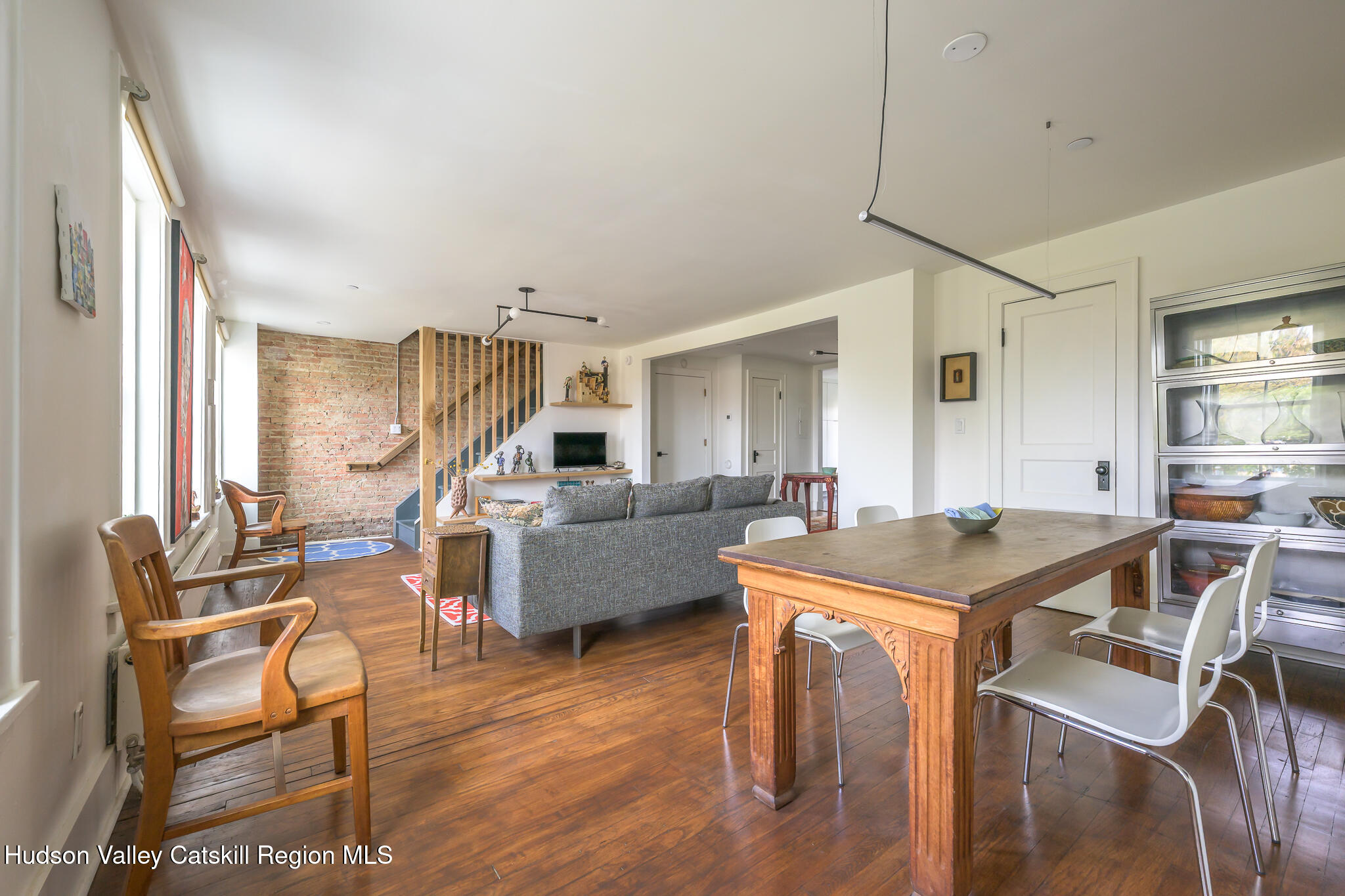 705 Warren Street Hudson, NY 12534 - Photo 23 of 40 a view of a livingroom with furniture and a table