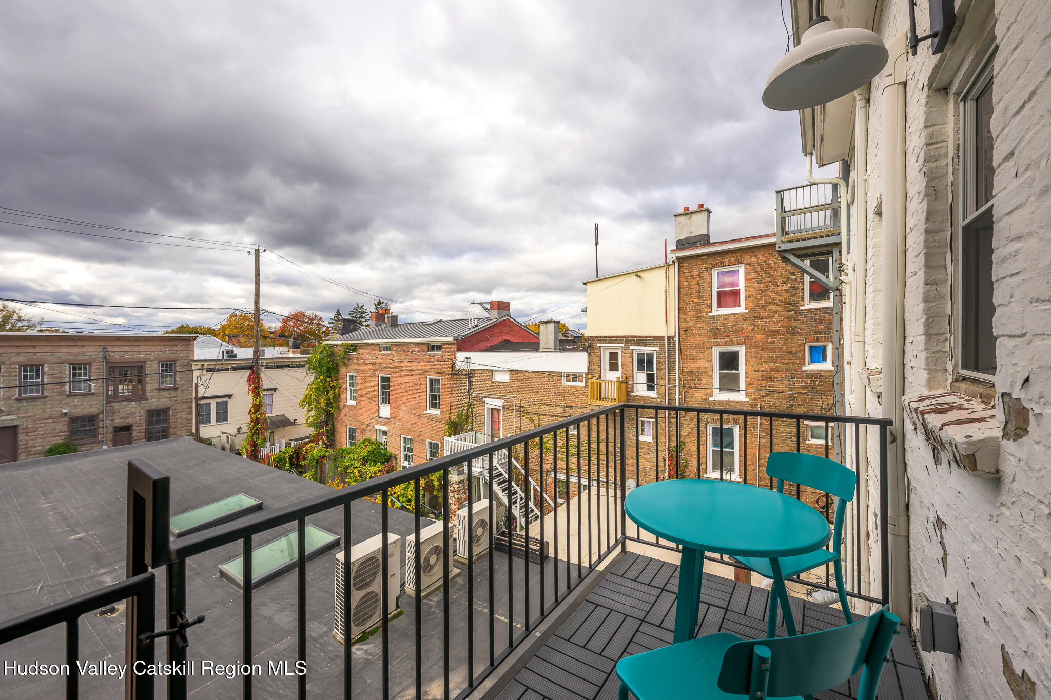 705 Warren Street Hudson, NY 12534 - Photo 28 of 40 a view of a balcony with chairs