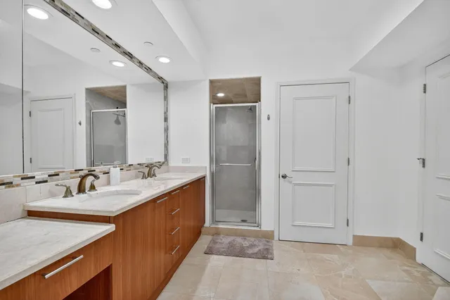 a view of a livingroom with wooden floor and a cabinet