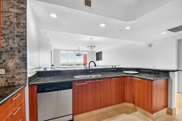 a view of a lake and a yard