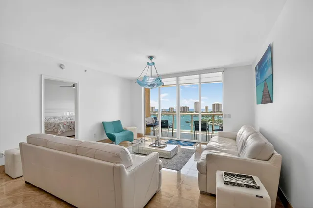 a view of a chairs and table in the patio
