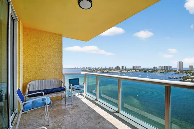 a view of a dinning table and chairs in the patio