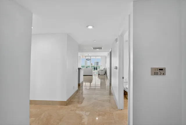 a bedroom with a bed and a tv