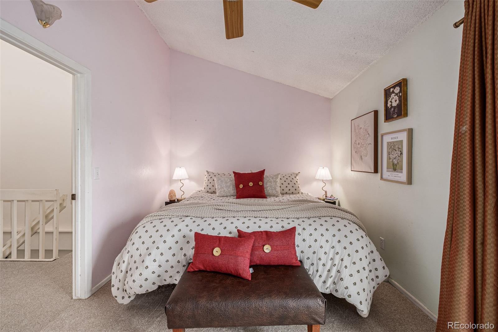 4233 East Maplewood Way Centennial, CO 80121 - Photo 16 of 50 a bedroom with bed and a window