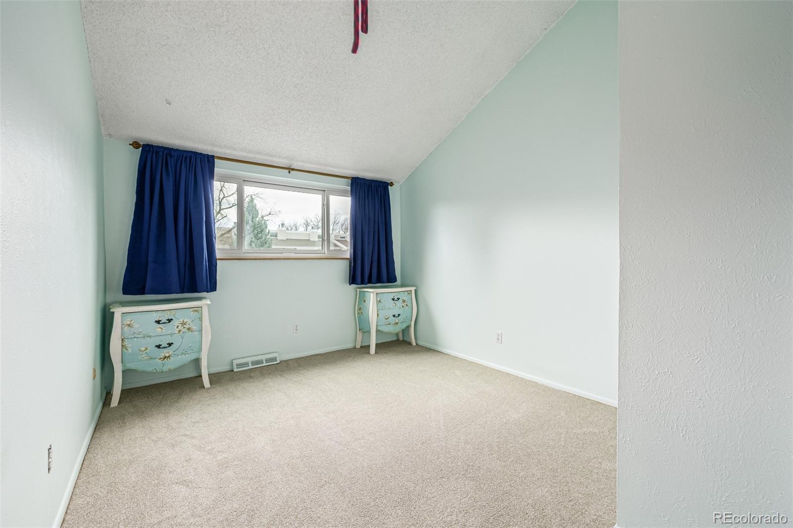 4233 East Maplewood Way Centennial, CO 80121 - Photo 20 of 50 an empty room with windows