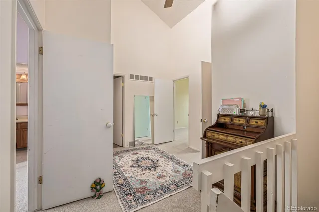 a kitchen with stainless steel appliances granite countertop a stove and a refrigerator