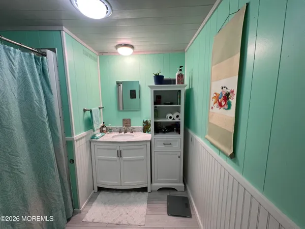 a room with cabinets and washer