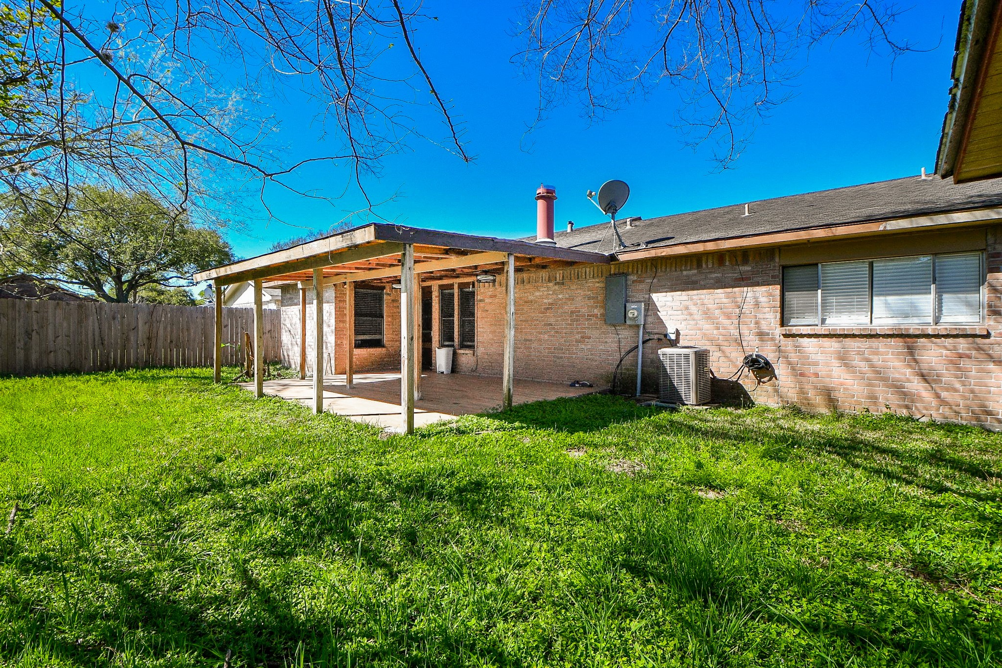 16711 Ribbonridge Drive Sugar Land, TX 77498 - Photo 23 of 24 a view of a house with a yard