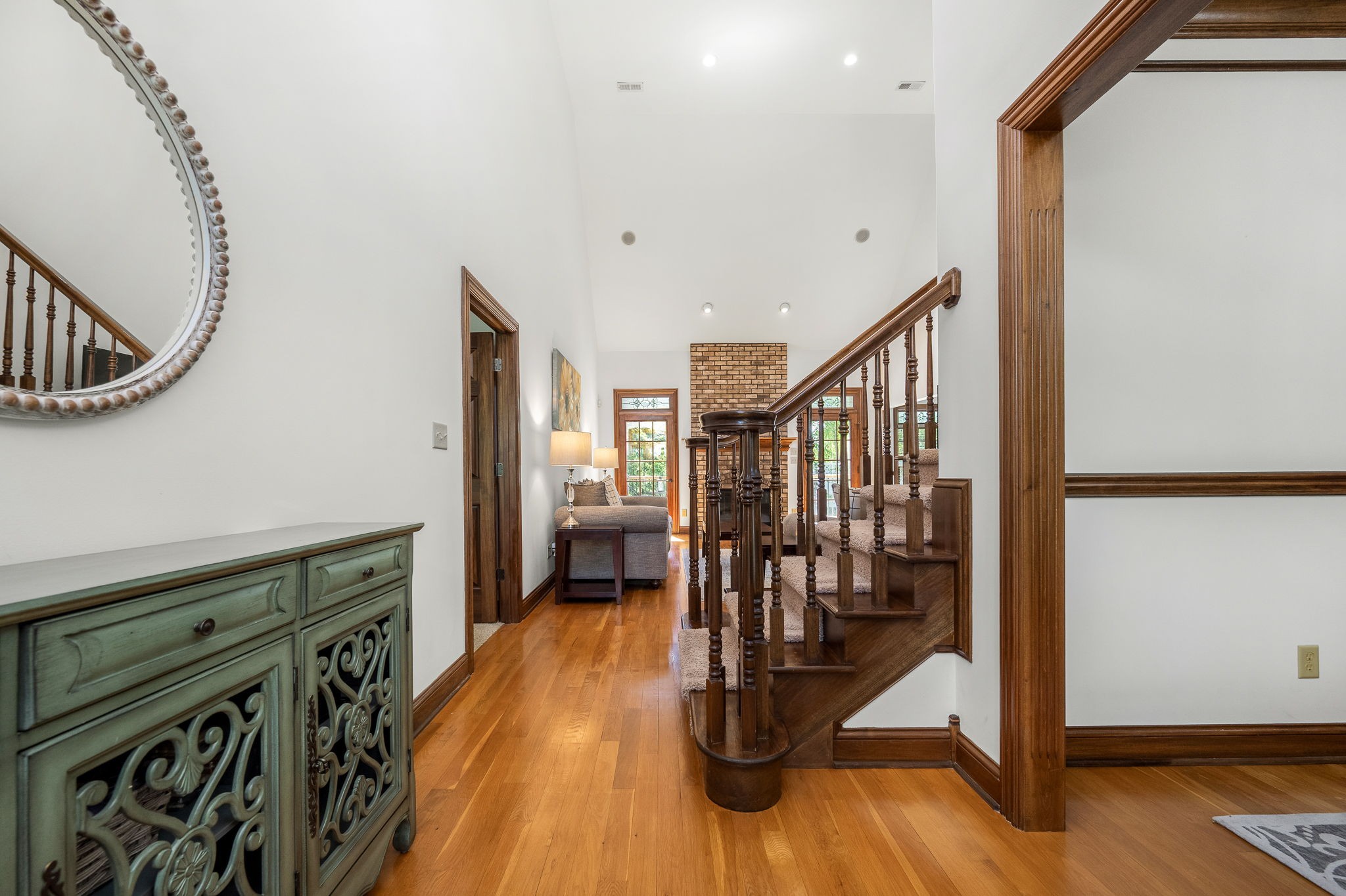 3040 Havasu Drive Spring Hill, TN 37174 - Photo 11 of 55 a view of a hallway with wooden floor and staircase