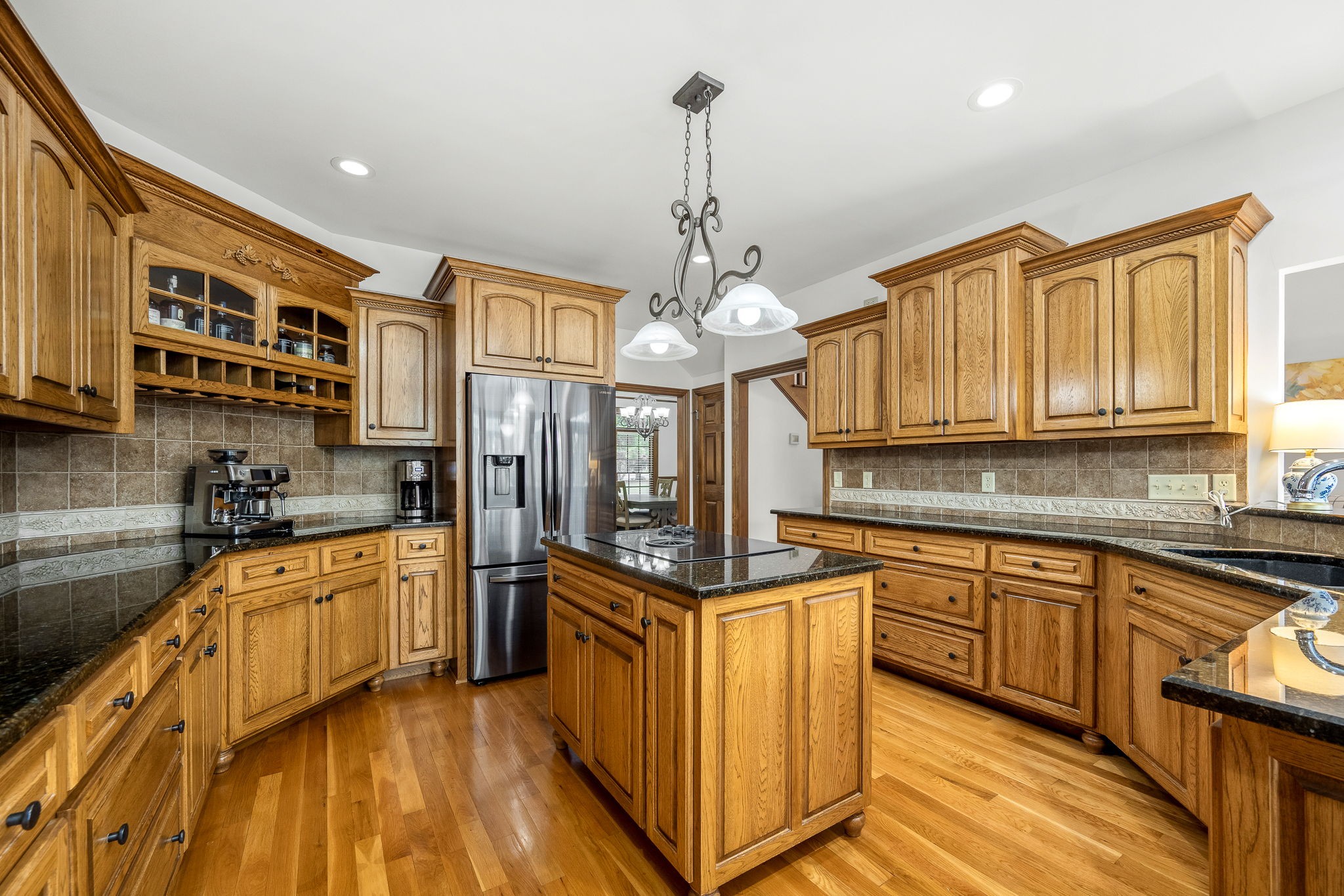 3040 Havasu Drive Spring Hill, TN 37174 - Photo 20 of 55 a kitchen with stainless steel appliances granite countertop a sink and cabinets