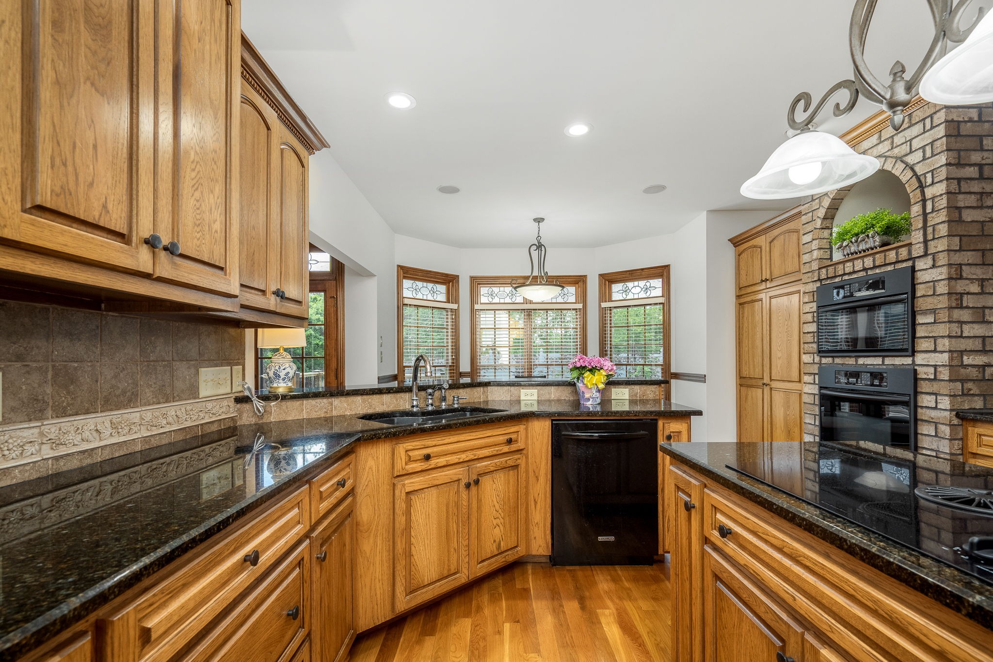 3040 Havasu Drive Spring Hill, TN 37174 - Photo 22 of 55 a kitchen with a sink and cabinets