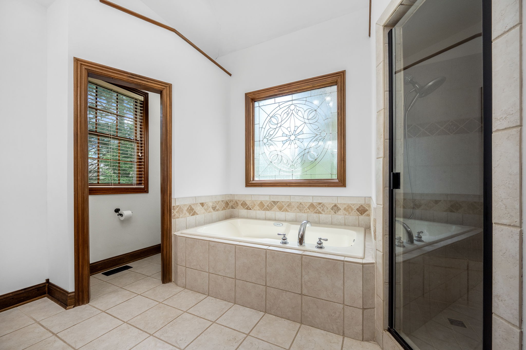 3040 Havasu Drive Spring Hill, TN 37174 - Photo 31 of 55 a bathroom with a tub sink and mirror