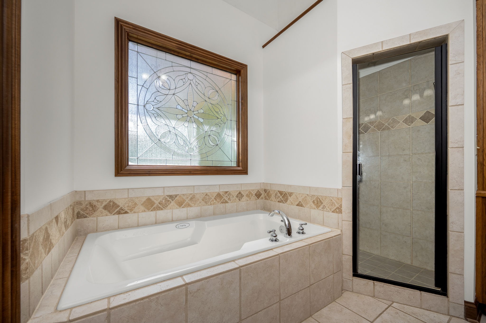 3040 Havasu Drive Spring Hill, TN 37174 - Photo 34 of 55 a bathroom with bathtub and window
