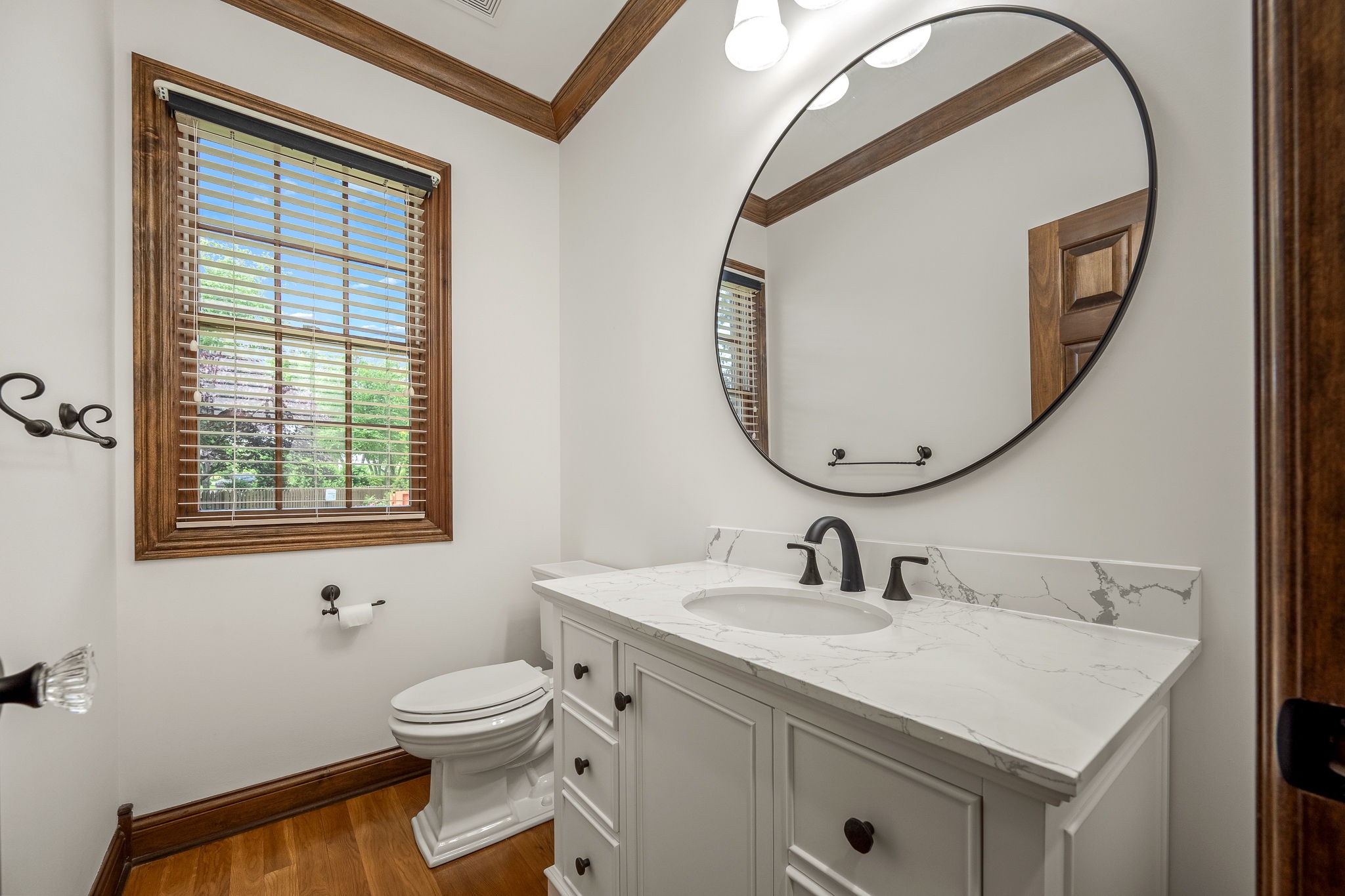 3040 Havasu Drive Spring Hill, TN 37174 - Photo 37 of 55 a bathroom with a toilet a sink a mirror and a window
