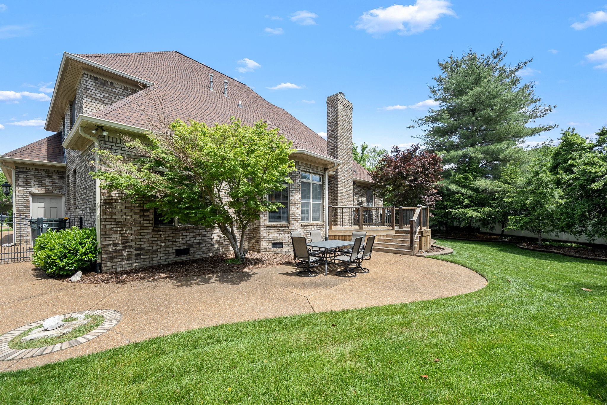 3040 Havasu Drive Spring Hill, TN 37174 - Photo 52 of 55 a patio with a table and chairs and potted plants