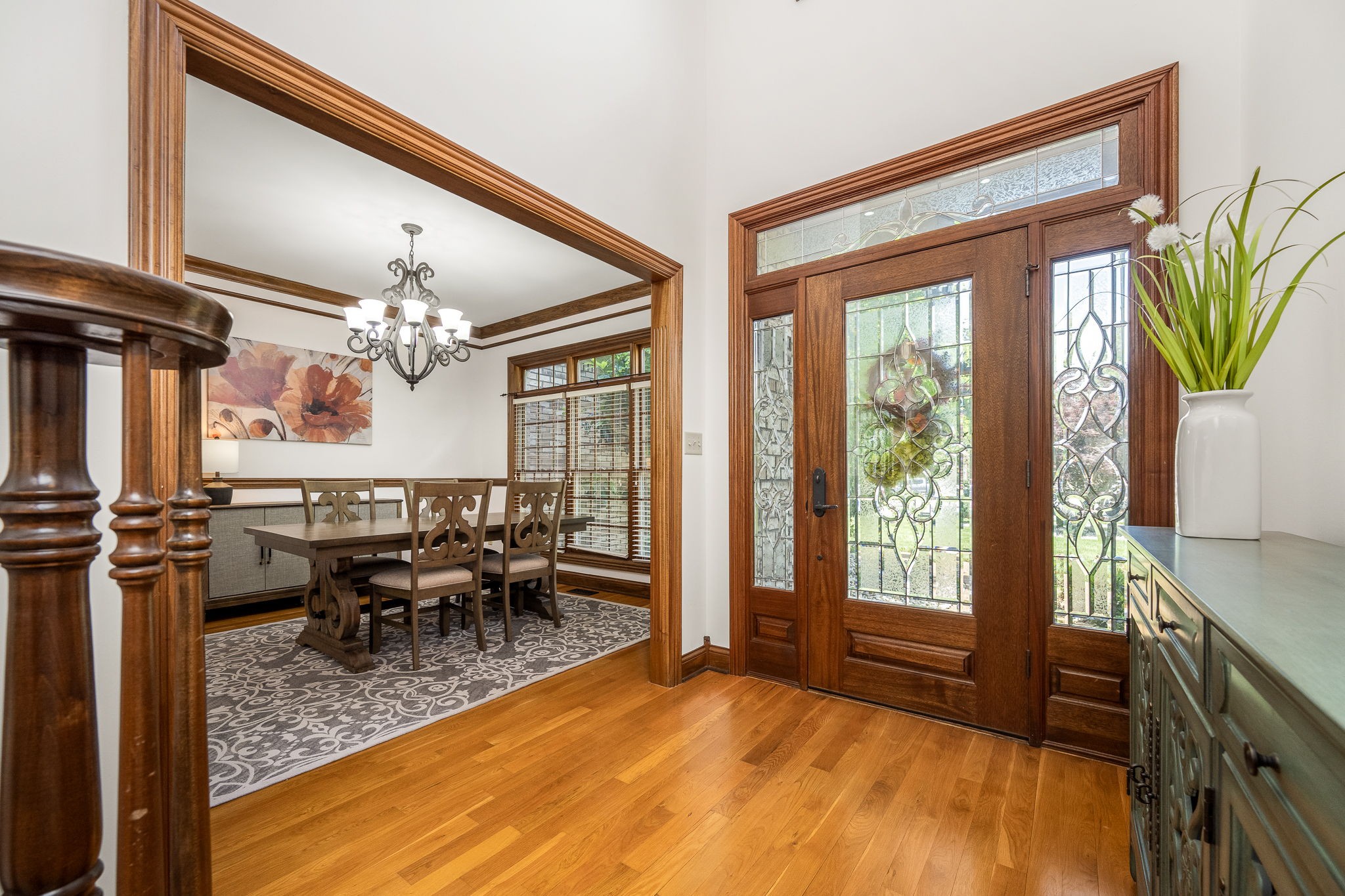 3040 Havasu Drive Spring Hill, TN 37174 - Photo 8 of 55 a view of a dining room with furniture a chandelier and wooden floor