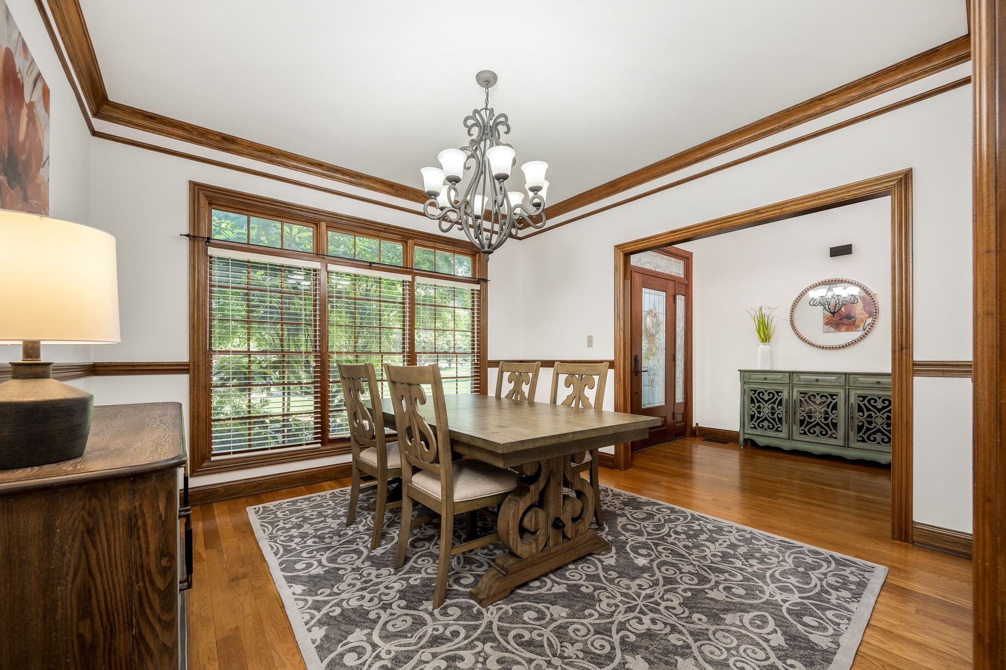 3040 Havasu Drive Spring Hill, TN 37174 - Photo 10 of 55 a dining room with furniture a rug and a chandelier