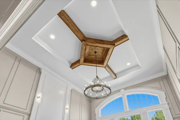 a kitchen with granite countertop a sink and a stove