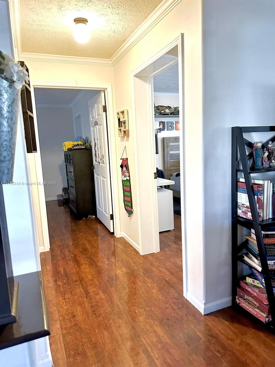 195 Southwest Turkey Glen Fort White, FL 32038 - Photo 13 of 25 a view of a storage & utility room with wooden floor