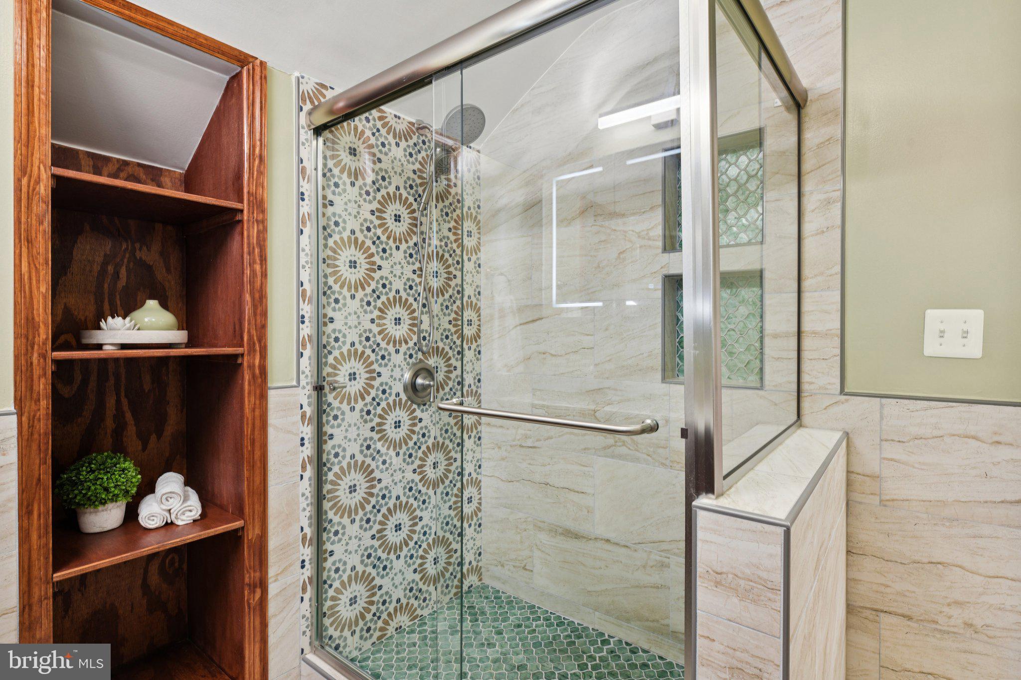 4012 Beechwood Road University Park, MD 20782 - Photo 30 of 56 a bathroom with a shower and a sink