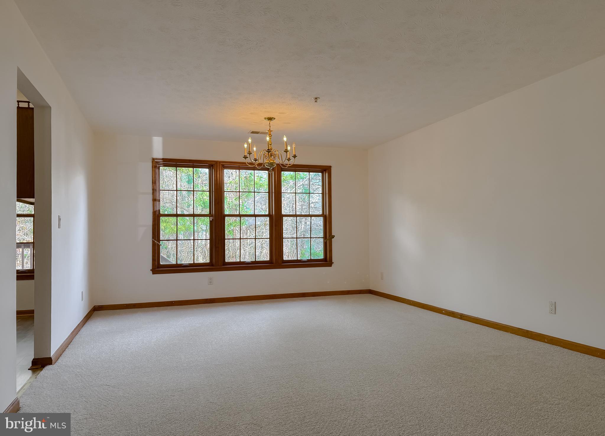 44029 Fieldstone Way California, MD 20619 - Photo 16 of 37 an empty room with a empty space and windows