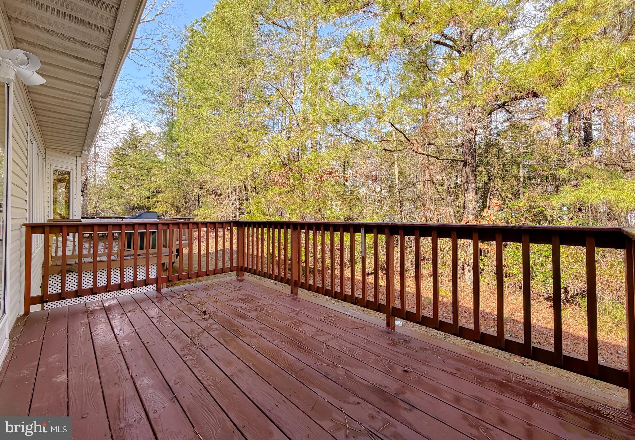 44029 Fieldstone Way California, MD 20619 - Photo 22 of 37 a view of wooden balcony with a bench