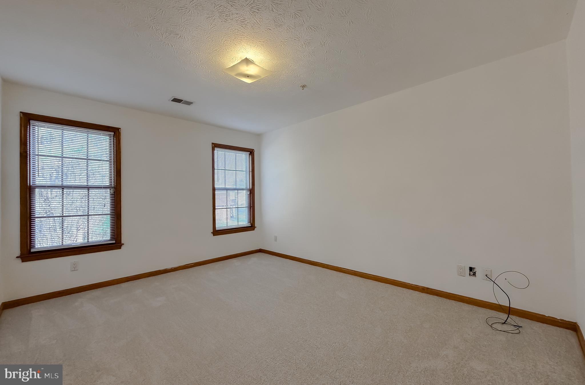44029 Fieldstone Way California, MD 20619 - Photo 29 of 37 an empty room with windows
