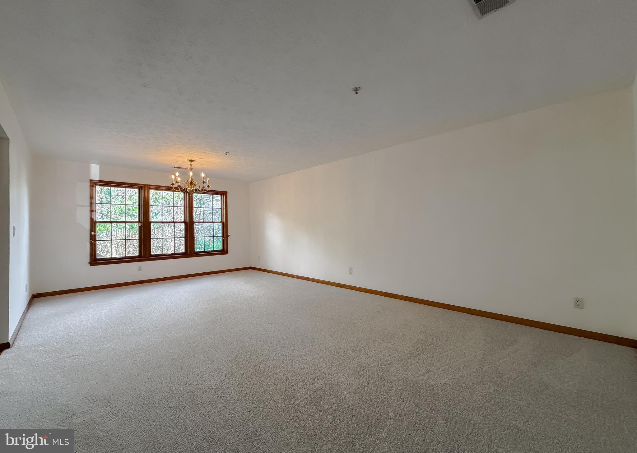 44029 Fieldstone Way California, MD 20619 - Photo 3 of 37 an empty room with windows