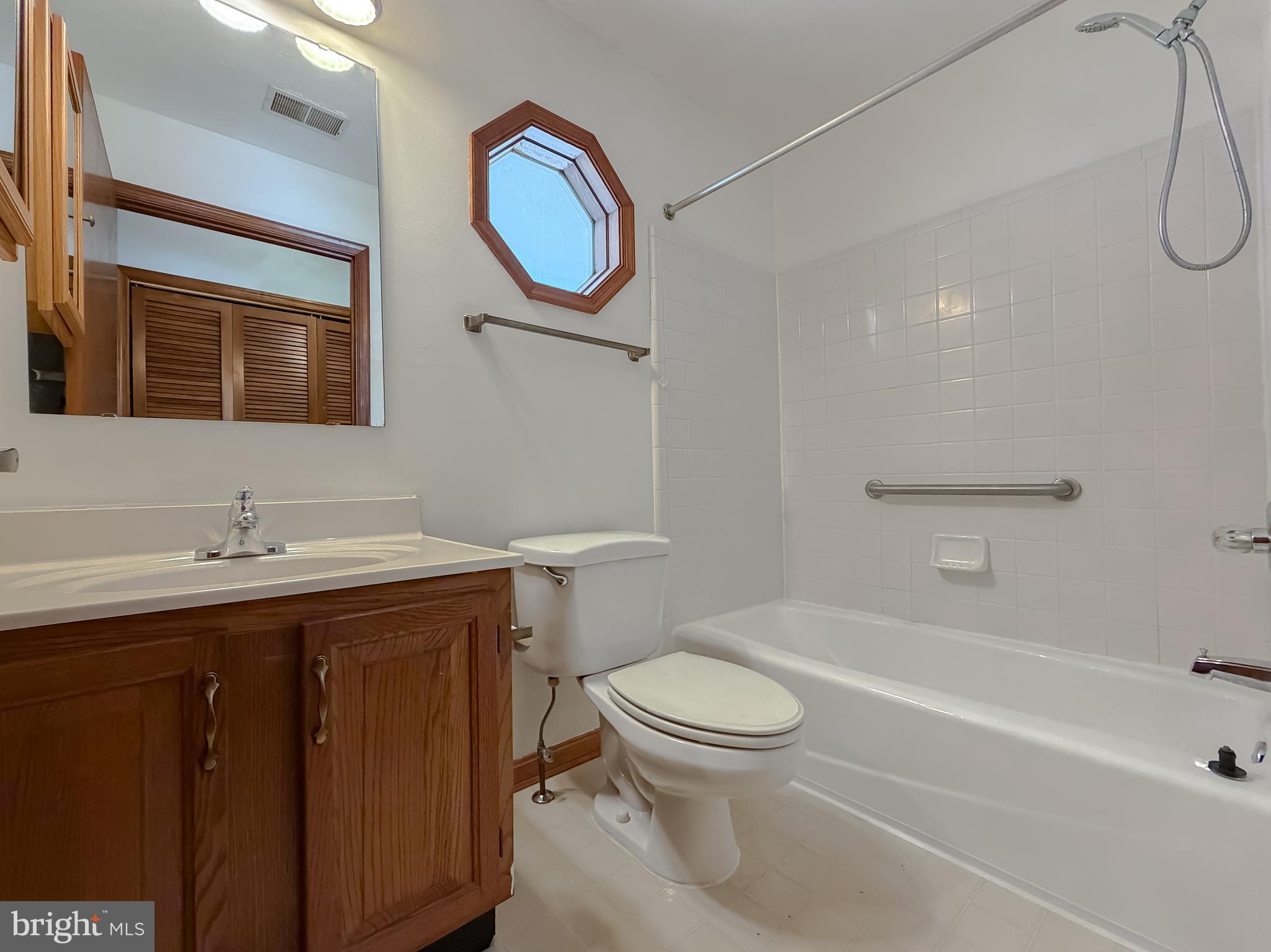 44029 Fieldstone Way California, MD 20619 - Photo 34 of 37 a bathroom with a sink a toilet and shower