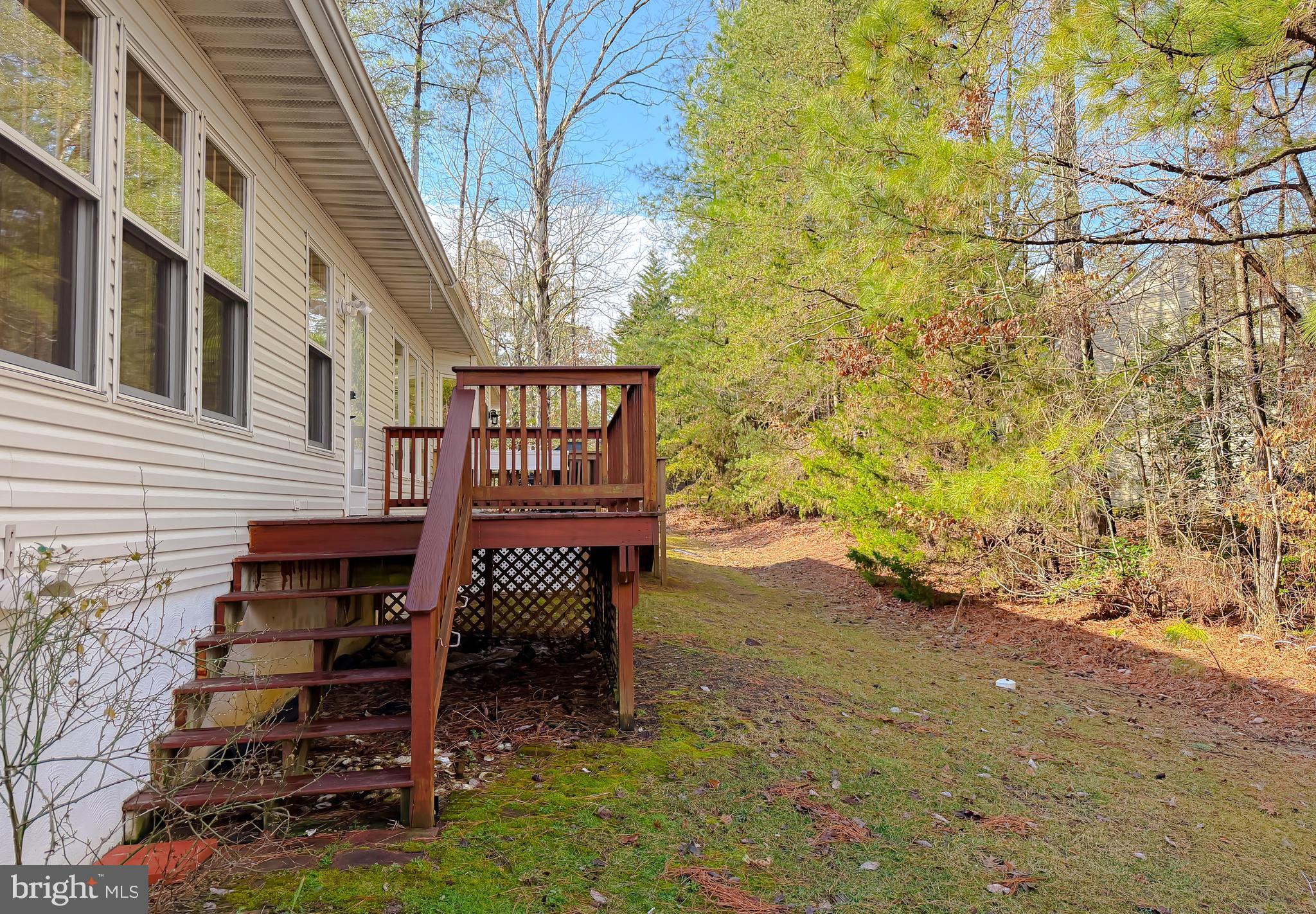 44029 Fieldstone Way California, MD 20619 - Photo 36 of 37 a view of a patio with a table and chairs
