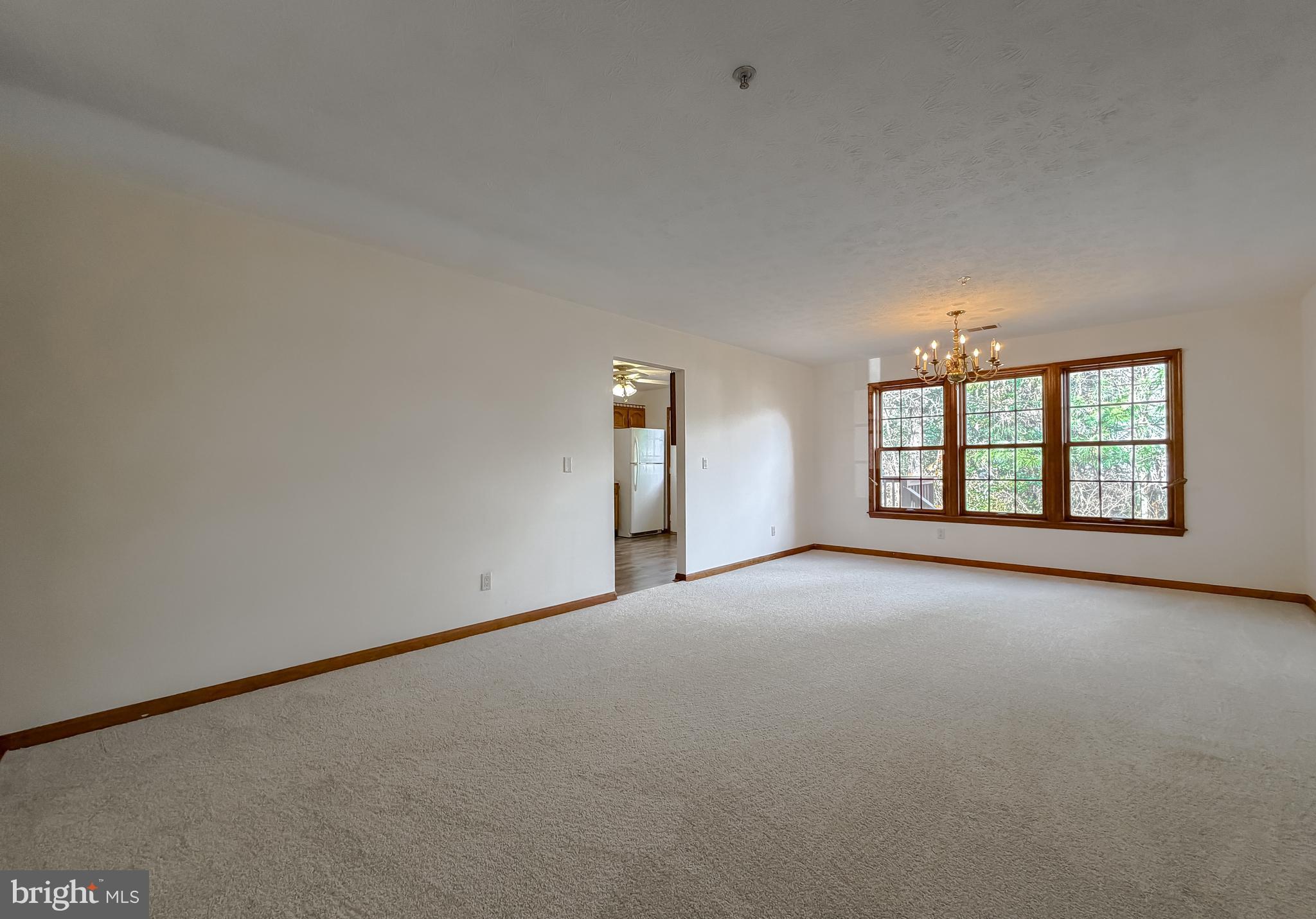 44029 Fieldstone Way California, MD 20619 - Photo 4 of 37 an empty room with windows