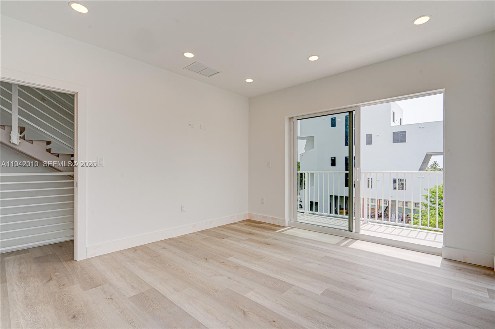 816 84th Street, Unit 2 Miami Beach, FL 33141 - Photo 19 of 19 a view of entryway with wooden floor