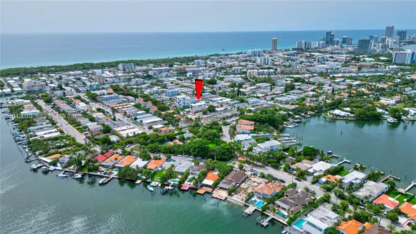 an aerial view of a houses and city view