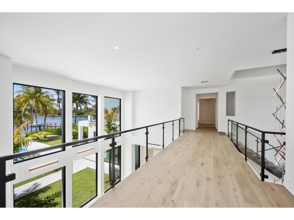 19311 North Riverside Drive Tequesta, FL 33469 - Photo 25 of 31 a view of an entryway with wooden floor