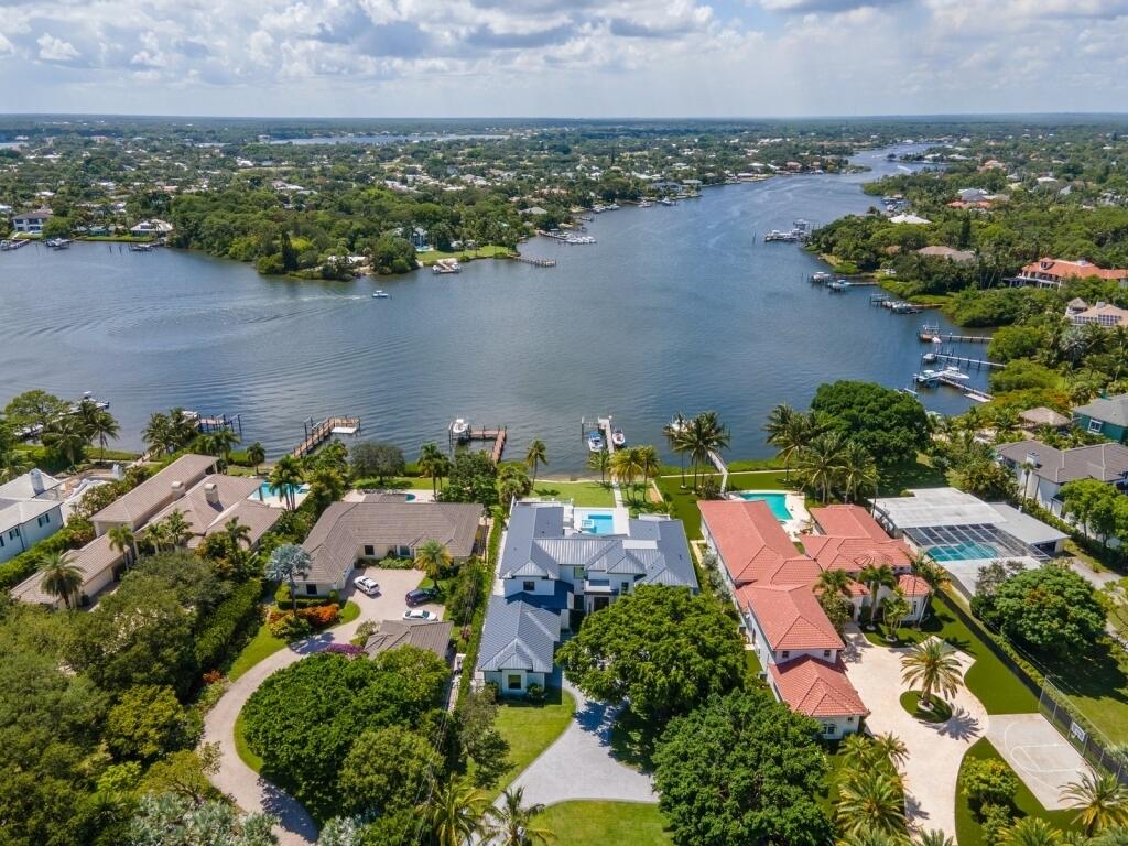 19311 North Riverside Drive Tequesta, FL 33469 - Photo 6 of 31 an aerial view of multiple house