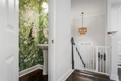a view of hallway with stairs