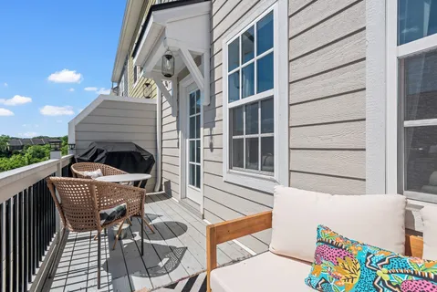 a view of a patio in back of house