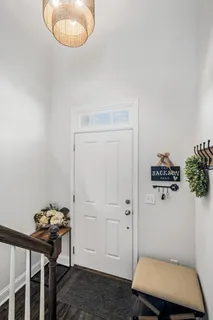 a room with a table and chairs