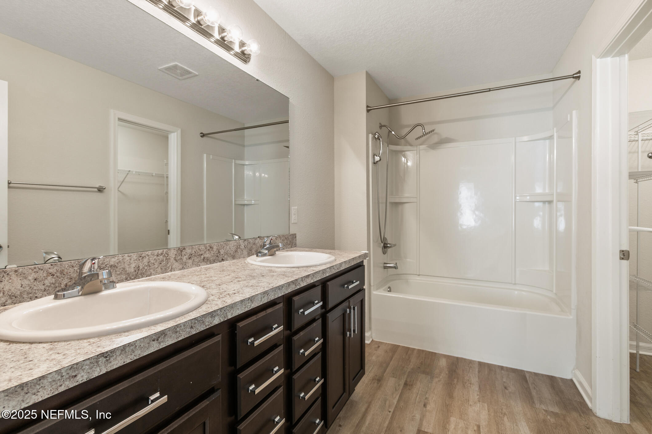 8882 Hogan Road Jacksonville, FL 32216 - Photo 22 of 42 Primary Bedroom - En Suite Bath