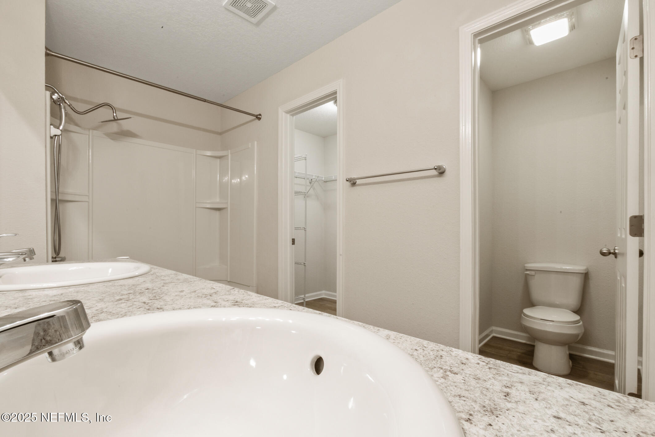8882 Hogan Road Jacksonville, FL 32216 - Photo 23 of 42 Primary Bedroom - En Suite Bath