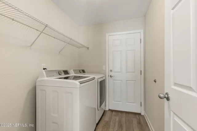 a utility room with dryer and washer