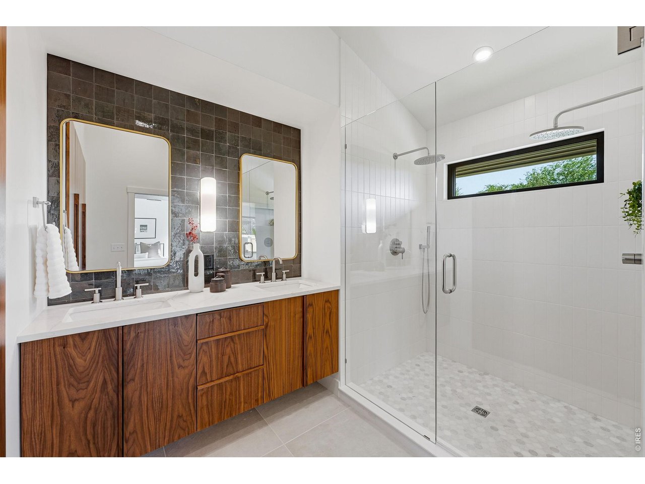 922 Club View Road Fort Collins, CO 80524 - Photo 27 of 50 Oversized walk-in shower with a dual-head shower system for a luxurious retreat-like experience