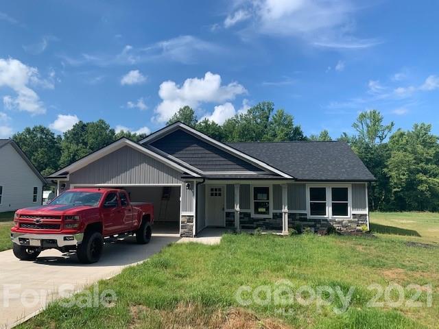 252 Scruggs Road Gaffney, SC 29341 - Photo 1 of 2 a front view of a house with a garden