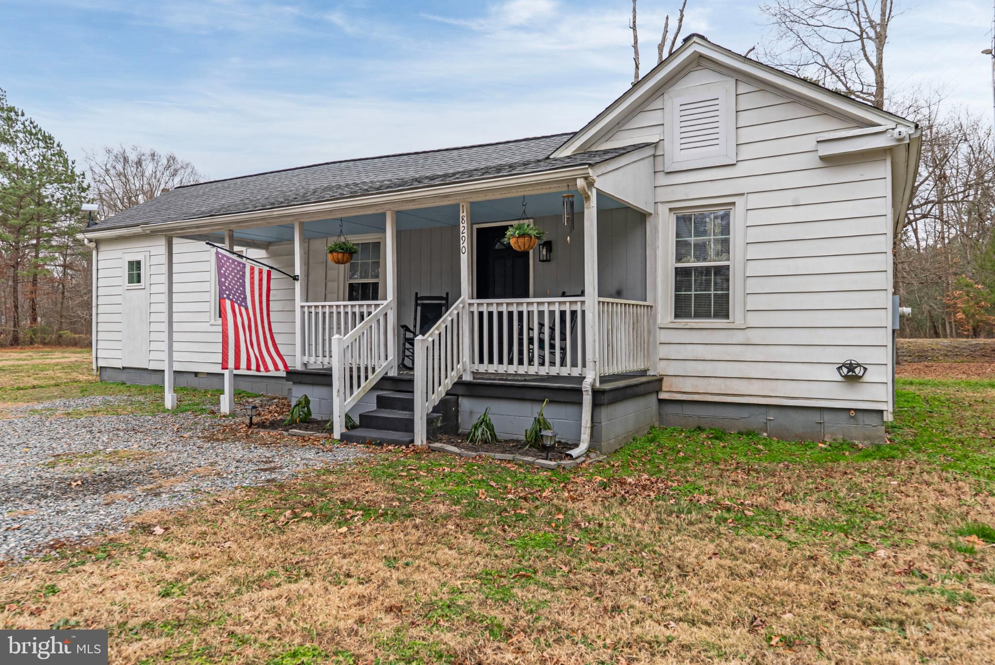 Charming home with a welcoming porch.