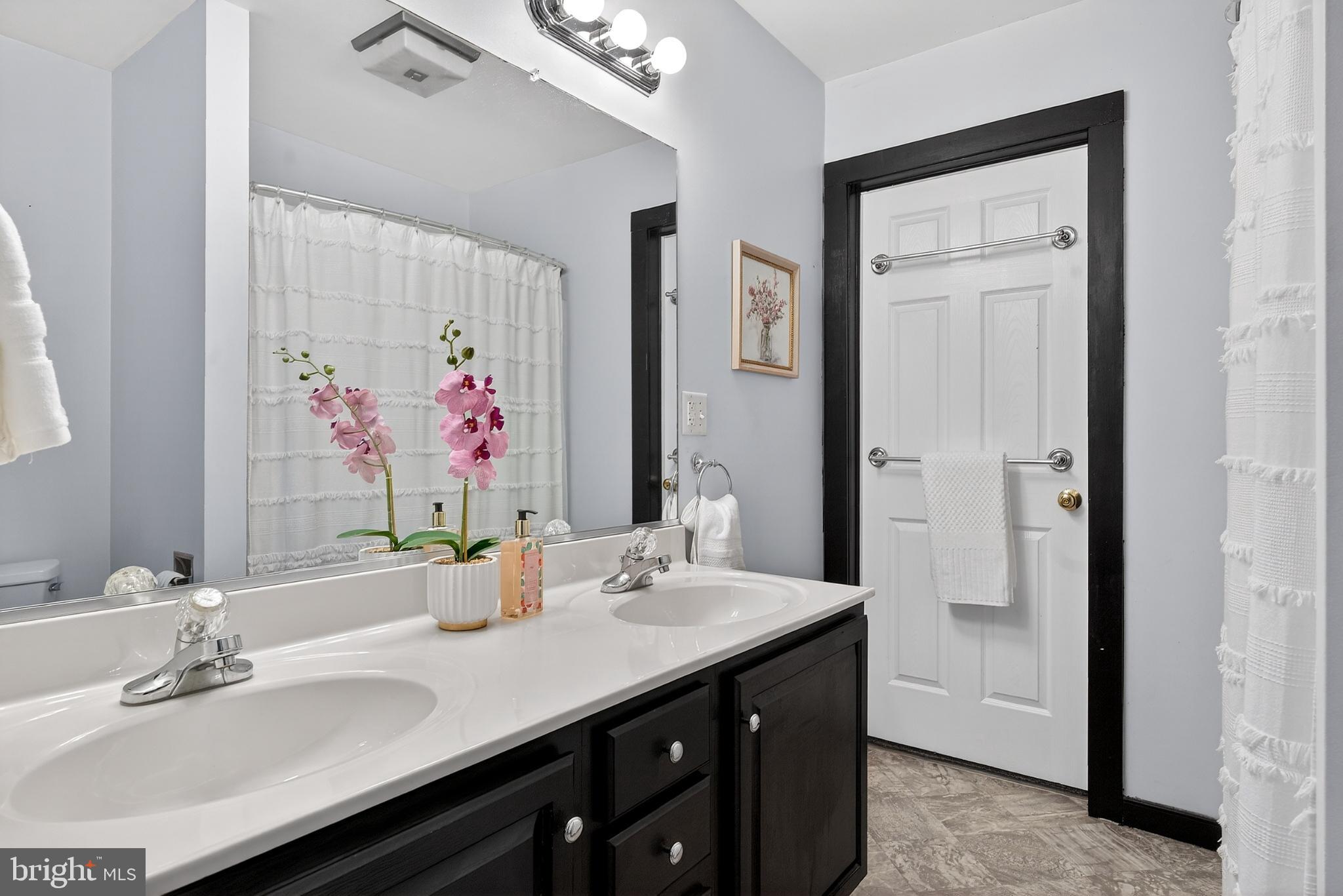 18290 Winston Loop Hanover, VA 23069 - Photo 14 of 23 Elegant bathroom with modern touches.