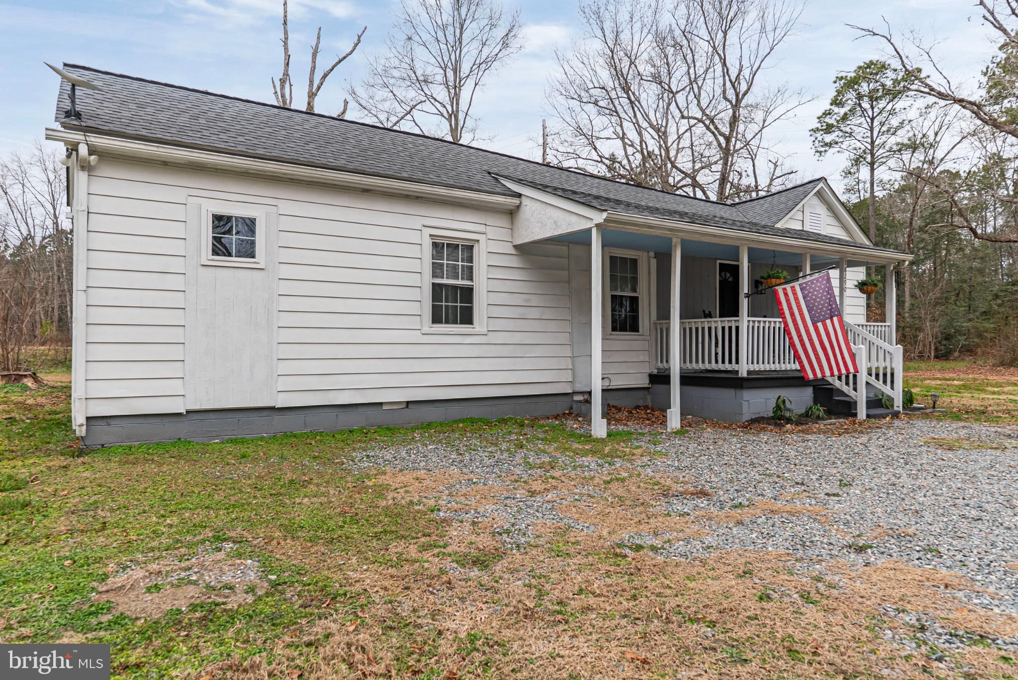 18290 Winston Loop Hanover, VA 23069 - Photo 21 of 23 Charming home with inviting porch and greenery.