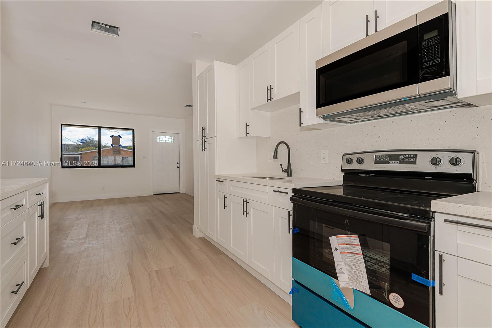 Coral Gate Miami, FL 33135 - Photo 12 of 23 a view of a kitchen with electric appliances